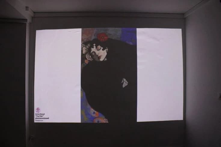 A painting shown on a gallery display in the supplied Paris exhibition archive