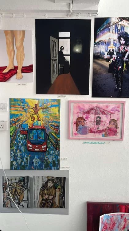Paintings arranged together on a white exhibition wall at KINSHIP × Hechyeomoyeo
