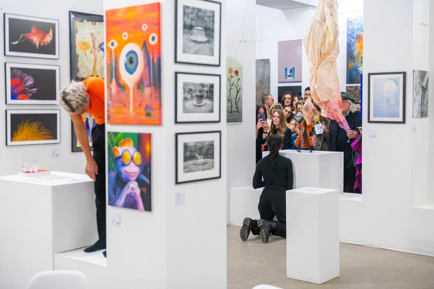 A view through the Contemporary Venice gallery and its visitors